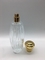 Luksusowe wysokie 100 ml puste butelki perfum Opryskiwacz zaciskany z okrągłą złotą nakrętką
